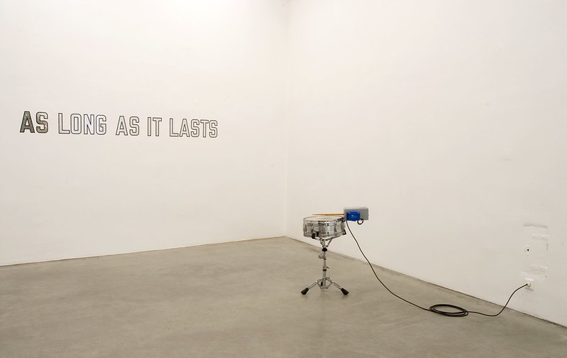 Installation view with works by Lawrence Weiner and Valentin Ruhry